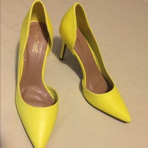 Neon yellow pumps